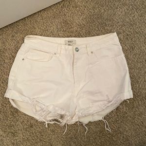 Women’s Forever 21 Mid Rise Jean Shorts. Color white. Size 30.